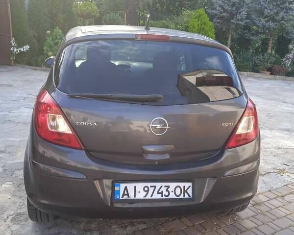 Серый Опель Корса, объемом двигателя 1.2 л и пробегом 255 тыс. км за 5400 $, фото 4 на Automoto.ua
