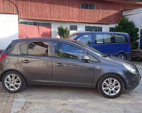 Серый Опель Корса, объемом двигателя 1.2 л и пробегом 255 тыс. км за 5400 $, фото 5 на Automoto.ua