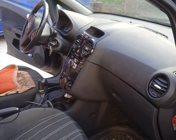 Серый Опель Корса, объемом двигателя 1.2 л и пробегом 255 тыс. км за 5400 $, фото 8 на Automoto.ua