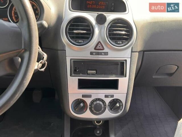 Серый Опель Корса, объемом двигателя 1.23 л и пробегом 117 тыс. км за 4700 $, фото 36 на Automoto.ua