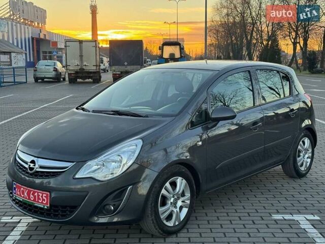 Серый Опель Корса, объемом двигателя 1.3 л и пробегом 176 тыс. км за 6550 $, фото 4 на Automoto.ua