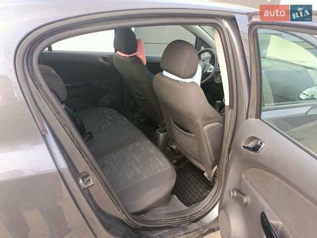 Серый Опель Корса, объемом двигателя 1.23 л и пробегом 314 тыс. км за 4900 $, фото 8 на Automoto.ua