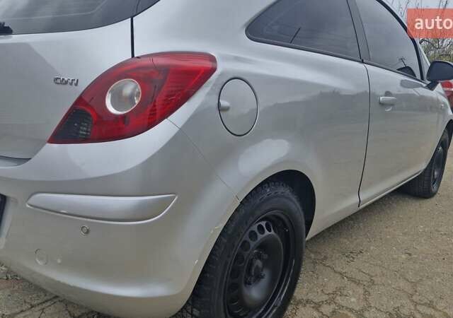 Серый Опель Корса, объемом двигателя 1.3 л и пробегом 220 тыс. км за 3650 $, фото 10 на Automoto.ua