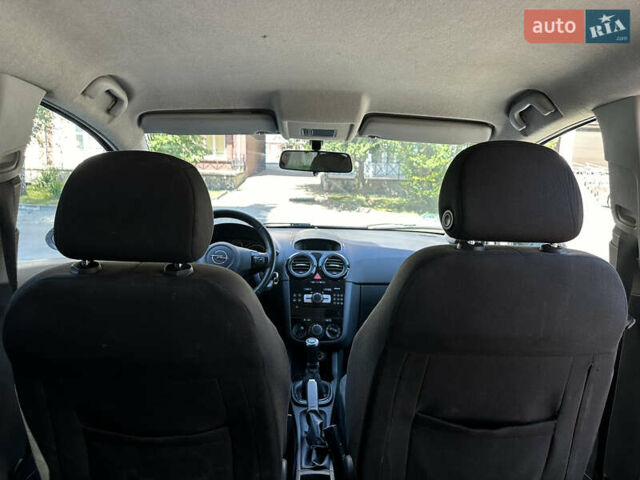 Серый Опель Корса, объемом двигателя 1.23 л и пробегом 189 тыс. км за 5400 $, фото 9 на Automoto.ua