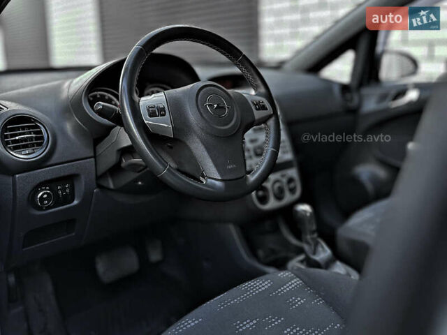 Сірий Опель Корса, об'ємом двигуна 1.4 л та пробігом 165 тис. км за 7399 $, фото 10 на Automoto.ua