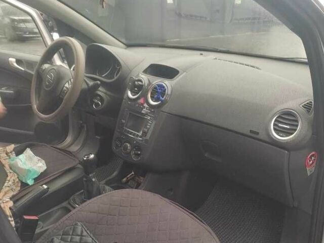 Серый Опель Корса, объемом двигателя 1.2 л и пробегом 325 тыс. км за 4800 $, фото 7 на Automoto.ua