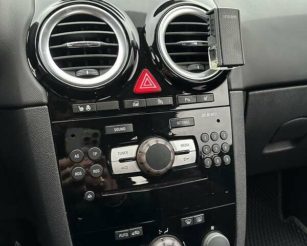 Серый Опель Корса, объемом двигателя 1.23 л и пробегом 172 тыс. км за 6100 $, фото 12 на Automoto.ua