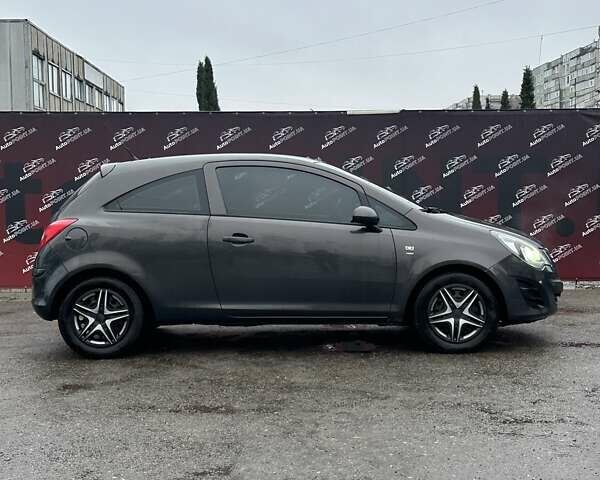 Серый Опель Корса, объемом двигателя 1.23 л и пробегом 172 тыс. км за 6100 $, фото 3 на Automoto.ua