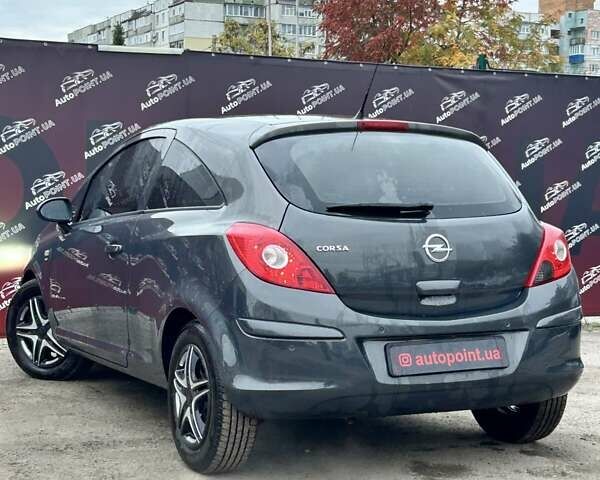 Серый Опель Корса, объемом двигателя 1.23 л и пробегом 172 тыс. км за 6100 $, фото 6 на Automoto.ua