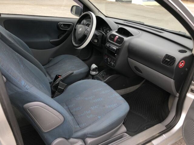 Серый Опель Корса, объемом двигателя 1.2 л и пробегом 160 тыс. км за 2700 $, фото 8 на Automoto.ua