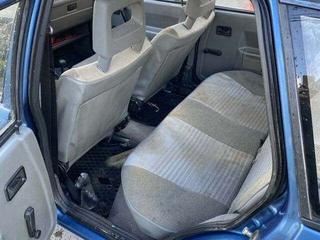 Синий Опель Корса, объемом двигателя 1.3 л и пробегом 51 тыс. км за 1300 $, фото 7 на Automoto.ua