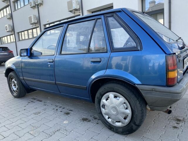 Синий Опель Корса, объемом двигателя 1.3 л и пробегом 51 тыс. км за 1300 $, фото 5 на Automoto.ua