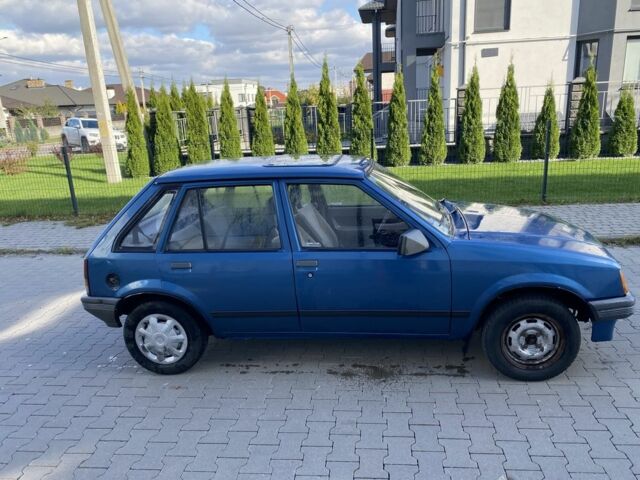 Синий Опель Корса, объемом двигателя 1.3 л и пробегом 51 тыс. км за 1300 $, фото 2 на Automoto.ua