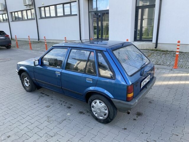 Синий Опель Корса, объемом двигателя 1.3 л и пробегом 51 тыс. км за 1300 $, фото 4 на Automoto.ua