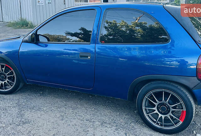 Синий Опель Корса, объемом двигателя 1.2 л и пробегом 100 тыс. км за 5500 $, фото 4 на Automoto.ua