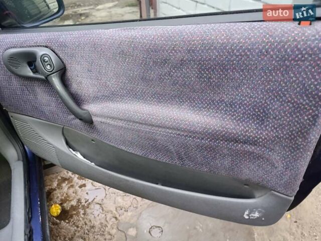 Синий Опель Корса, объемом двигателя 1.2 л и пробегом 200 тыс. км за 1800 $, фото 10 на Automoto.ua