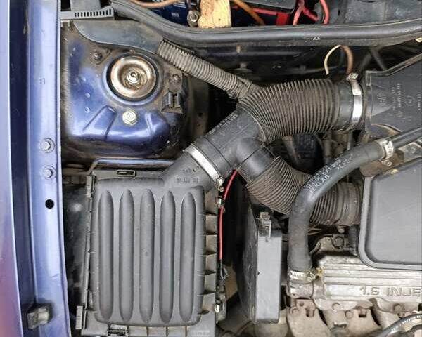 Синий Опель Корса, объемом двигателя 1.2 л и пробегом 200 тыс. км за 1800 $, фото 12 на Automoto.ua