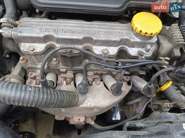 Синий Опель Корса, объемом двигателя 1.2 л и пробегом 200 тыс. км за 1800 $, фото 14 на Automoto.ua