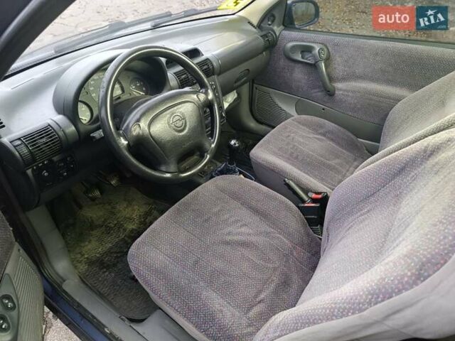 Синий Опель Корса, объемом двигателя 1.2 л и пробегом 200 тыс. км за 1800 $, фото 7 на Automoto.ua