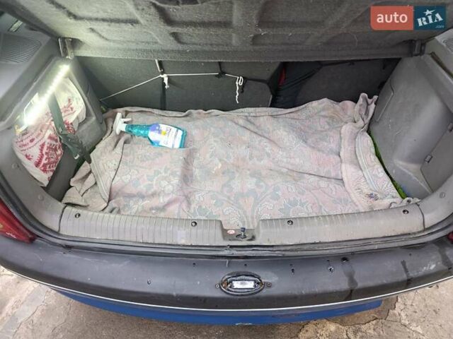 Синий Опель Корса, объемом двигателя 1.2 л и пробегом 200 тыс. км за 1800 $, фото 16 на Automoto.ua