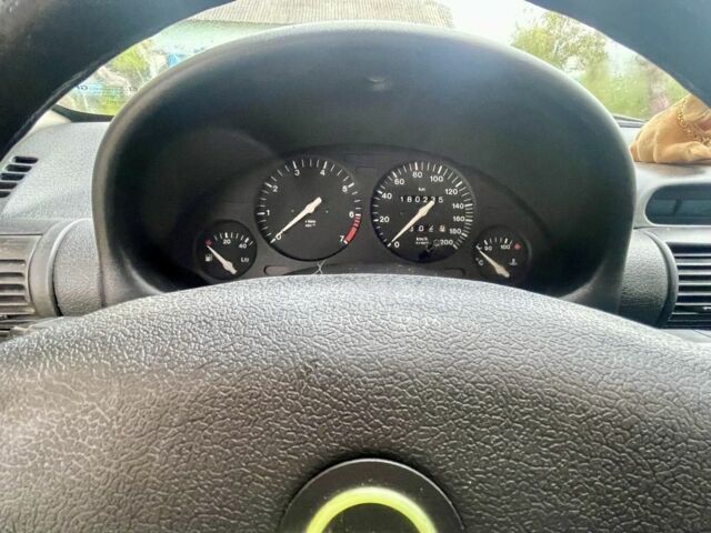 Синий Опель Корса, объемом двигателя 1.2 л и пробегом 190 тыс. км за 1700 $, фото 18 на Automoto.ua