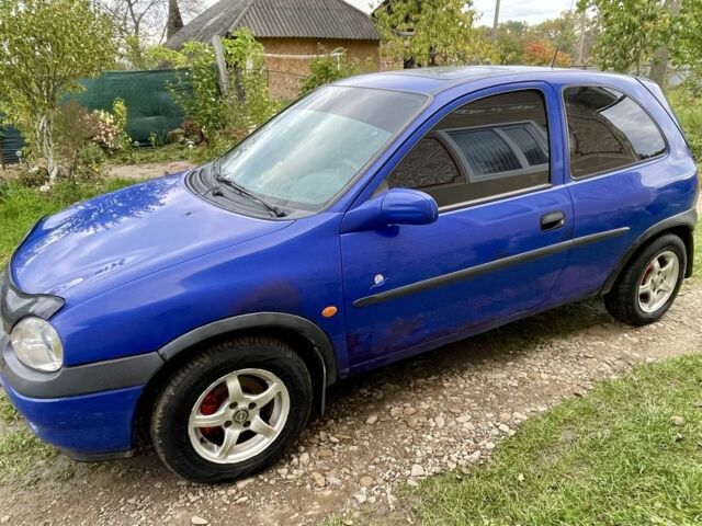 Синий Опель Корса, объемом двигателя 1.2 л и пробегом 190 тыс. км за 1700 $, фото 2 на Automoto.ua