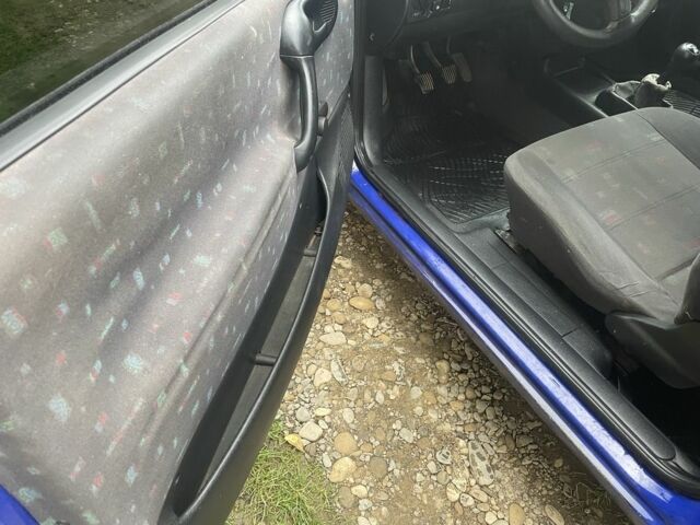 Синий Опель Корса, объемом двигателя 1.2 л и пробегом 190 тыс. км за 1700 $, фото 11 на Automoto.ua