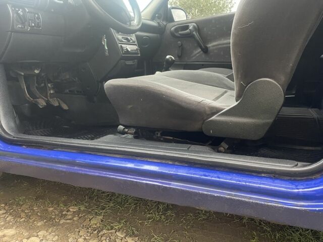 Синий Опель Корса, объемом двигателя 1.2 л и пробегом 190 тыс. км за 1700 $, фото 16 на Automoto.ua