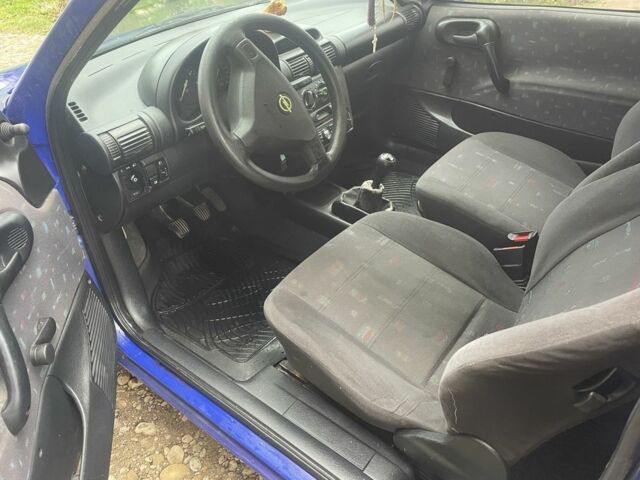 Синий Опель Корса, объемом двигателя 1.2 л и пробегом 190 тыс. км за 1700 $, фото 12 на Automoto.ua