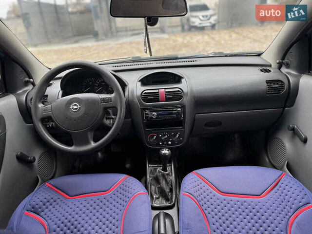 Синий Опель Корса, объемом двигателя 1.2 л и пробегом 200 тыс. км за 2200 $, фото 9 на Automoto.ua