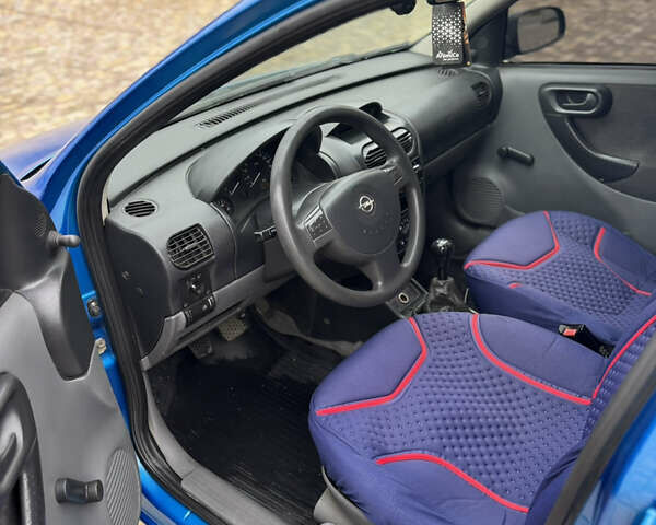 Синий Опель Корса, объемом двигателя 1.2 л и пробегом 200 тыс. км за 2200 $, фото 5 на Automoto.ua