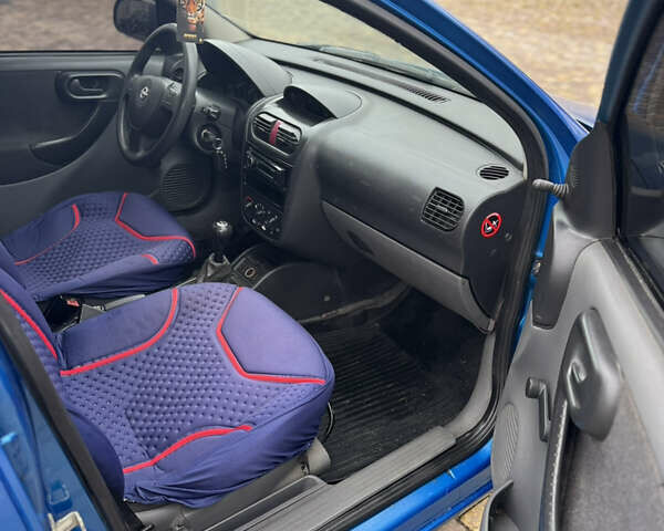 Синий Опель Корса, объемом двигателя 1.2 л и пробегом 250 тыс. км за 2199 $, фото 8 на Automoto.ua