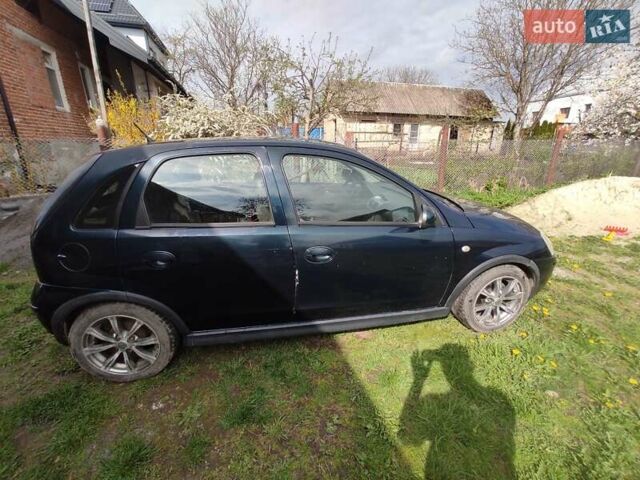 Синій Опель Корса, об'ємом двигуна 1.23 л та пробігом 166 тис. км за 2300 $, фото 5 на Automoto.ua
