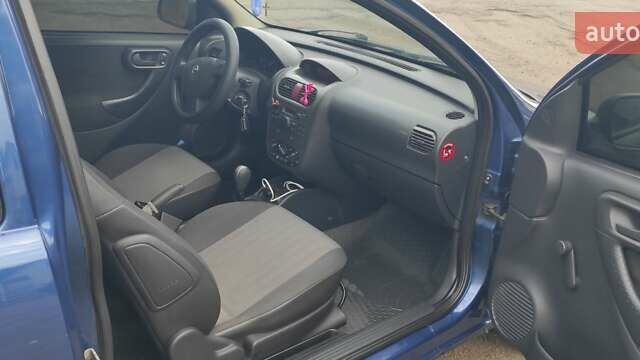 Синий Опель Корса, объемом двигателя 1 л и пробегом 274 тыс. км за 3000 $, фото 11 на Automoto.ua