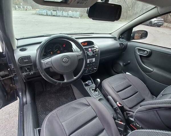 Синий Опель Корса, объемом двигателя 1.2 л и пробегом 239 тыс. км за 4000 $, фото 3 на Automoto.ua