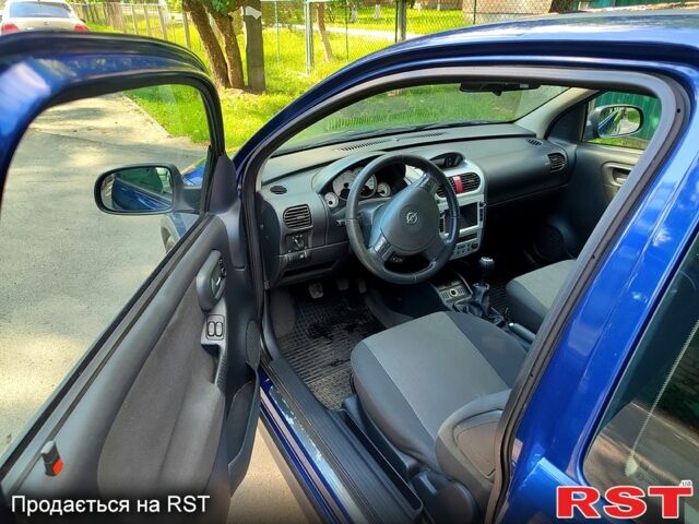 Синій Опель Корса, об'ємом двигуна 1 л та пробігом 214 тис. км за 2999 $, фото 4 на Automoto.ua