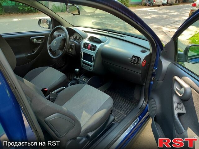 Синій Опель Корса, об'ємом двигуна 1 л та пробігом 214 тис. км за 2999 $, фото 5 на Automoto.ua