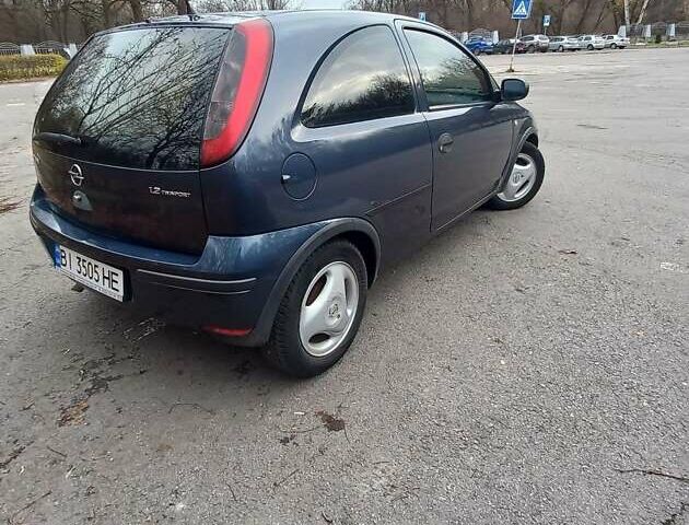 Синий Опель Корса, объемом двигателя 1.2 л и пробегом 239 тыс. км за 4000 $, фото 5 на Automoto.ua