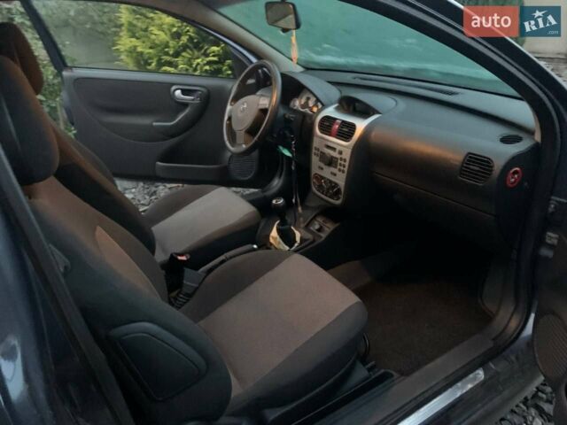 Синій Опель Корса, об'ємом двигуна 1 л та пробігом 145 тис. км за 4000 $, фото 9 на Automoto.ua