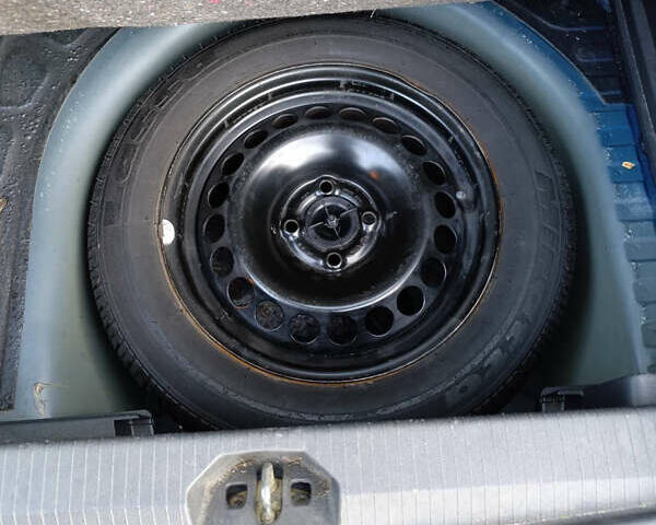 Синій Опель Корса, об'ємом двигуна 1.2 л та пробігом 210 тис. км за 3900 $, фото 5 на Automoto.ua