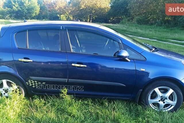 Синій Опель Корса, об'ємом двигуна 1.23 л та пробігом 157 тис. км за 4100 $, фото 5 на Automoto.ua