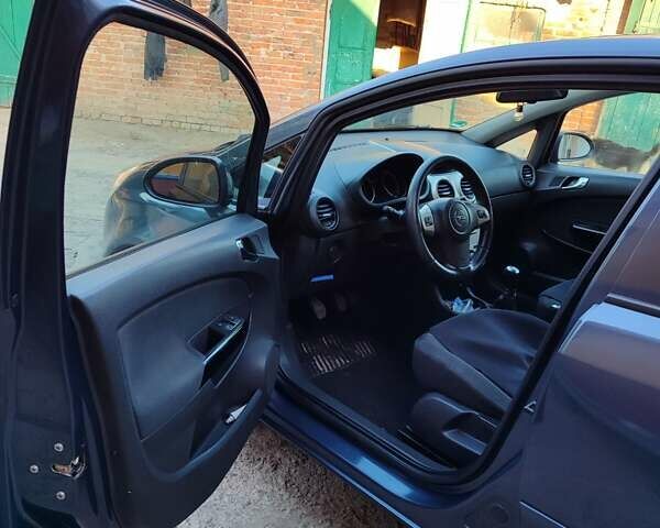 Синій Опель Корса, об'ємом двигуна 1.2 л та пробігом 250 тис. км за 4000 $, фото 17 на Automoto.ua