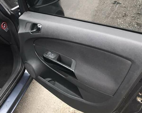 Синій Опель Корса, об'ємом двигуна 1.2 л та пробігом 218 тис. км за 4650 $, фото 11 на Automoto.ua