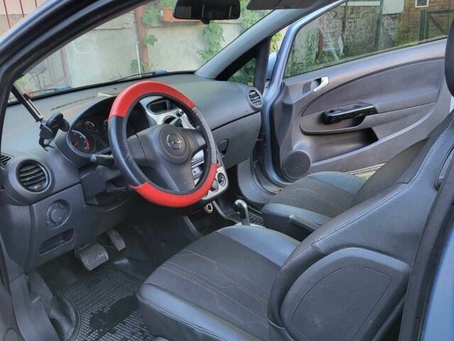 Синій Опель Корса, об'ємом двигуна 1.2 л та пробігом 230 тис. км за 3506 $, фото 2 на Automoto.ua