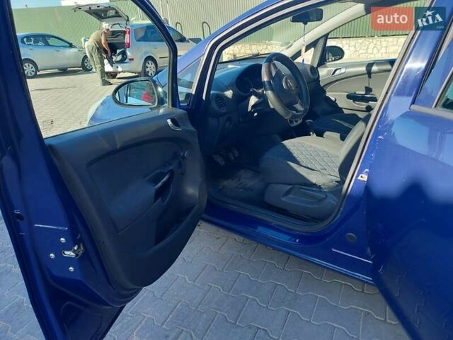 Синий Опель Корса, объемом двигателя 1 л и пробегом 136 тыс. км за 3900 $, фото 3 на Automoto.ua