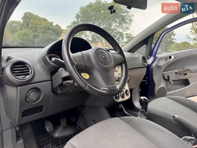 Синій Опель Корса, об'ємом двигуна 1 л та пробігом 215 тис. км за 3999 $, фото 28 на Automoto.ua