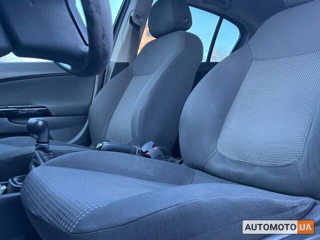 Синий Опель Корса, объемом двигателя 1 л и пробегом 137 тыс. км за 5800 $, фото 8 на Automoto.ua