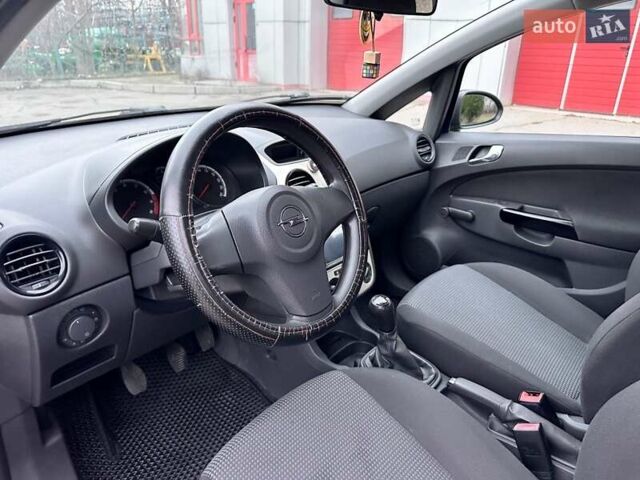 Синий Опель Корса, объемом двигателя 1 л и пробегом 213 тыс. км за 4300 $, фото 32 на Automoto.ua