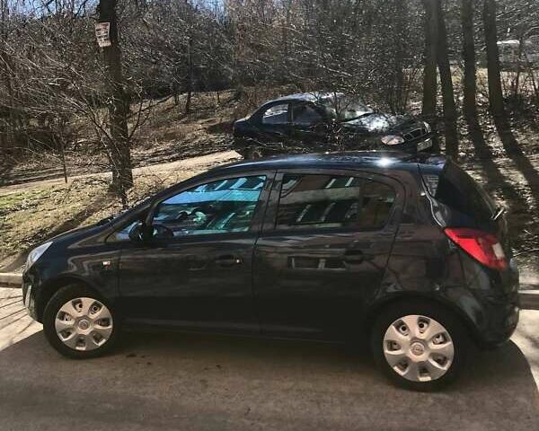 Синий Опель Корса, объемом двигателя 1.3 л и пробегом 240 тыс. км за 4950 $, фото 5 на Automoto.ua