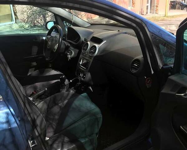 Синий Опель Корса, объемом двигателя 1.3 л и пробегом 240 тыс. км за 4950 $, фото 7 на Automoto.ua